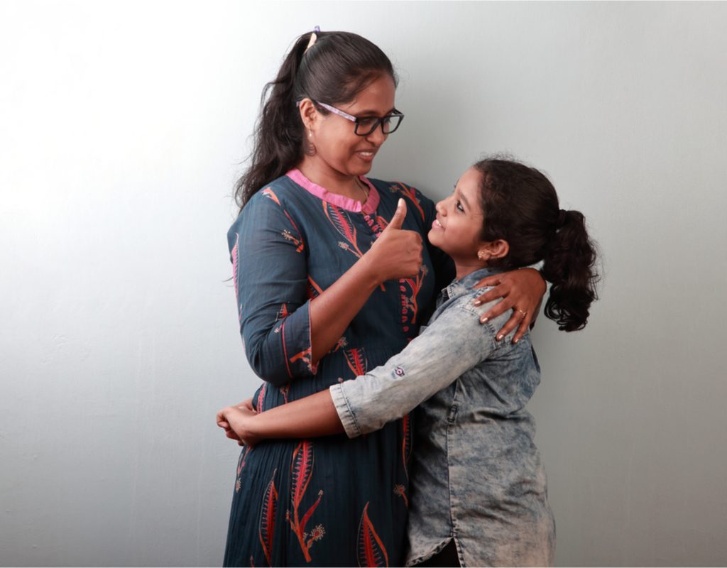 Mom sharing words of encouragement with her daughter