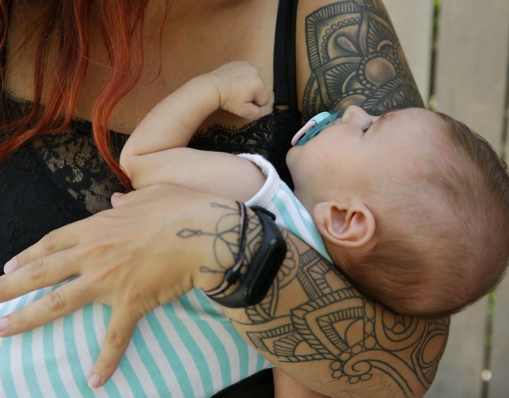 tattooed mom with baby