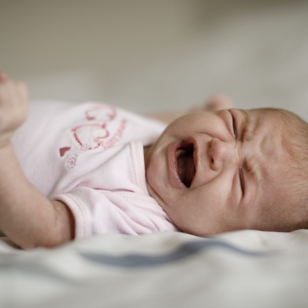Newborn baby girl crying