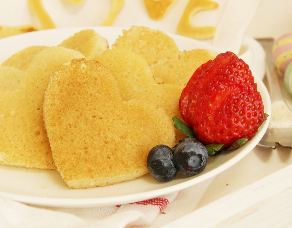 plate of heart-shaped pancakes for Valentine's Day