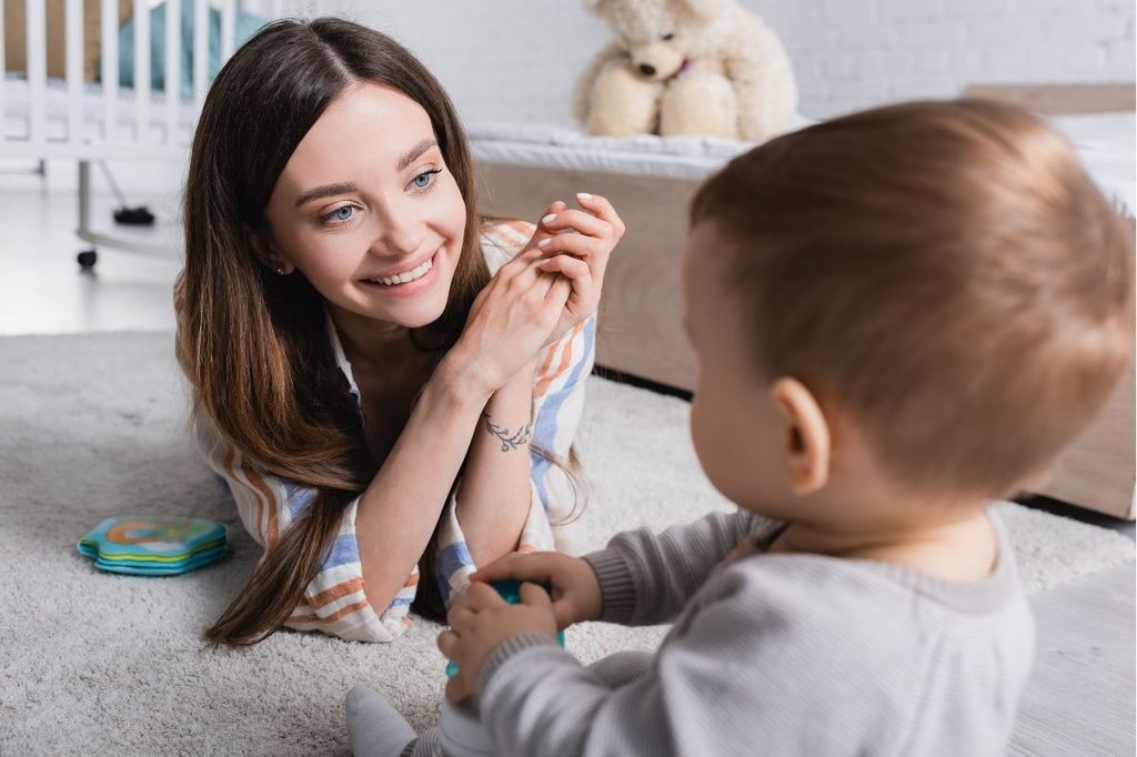 mom on floor with baby