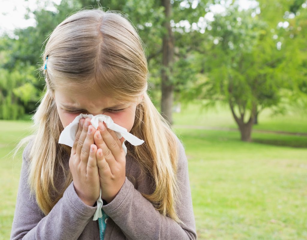 young girls suffering from seasonal allergy symptoms
