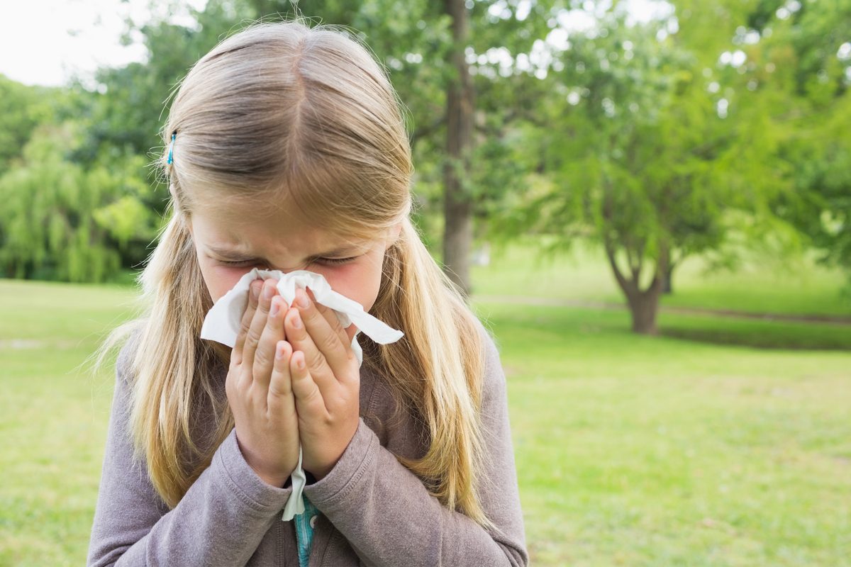 Young girls suffering from seasonal allergy symptoms