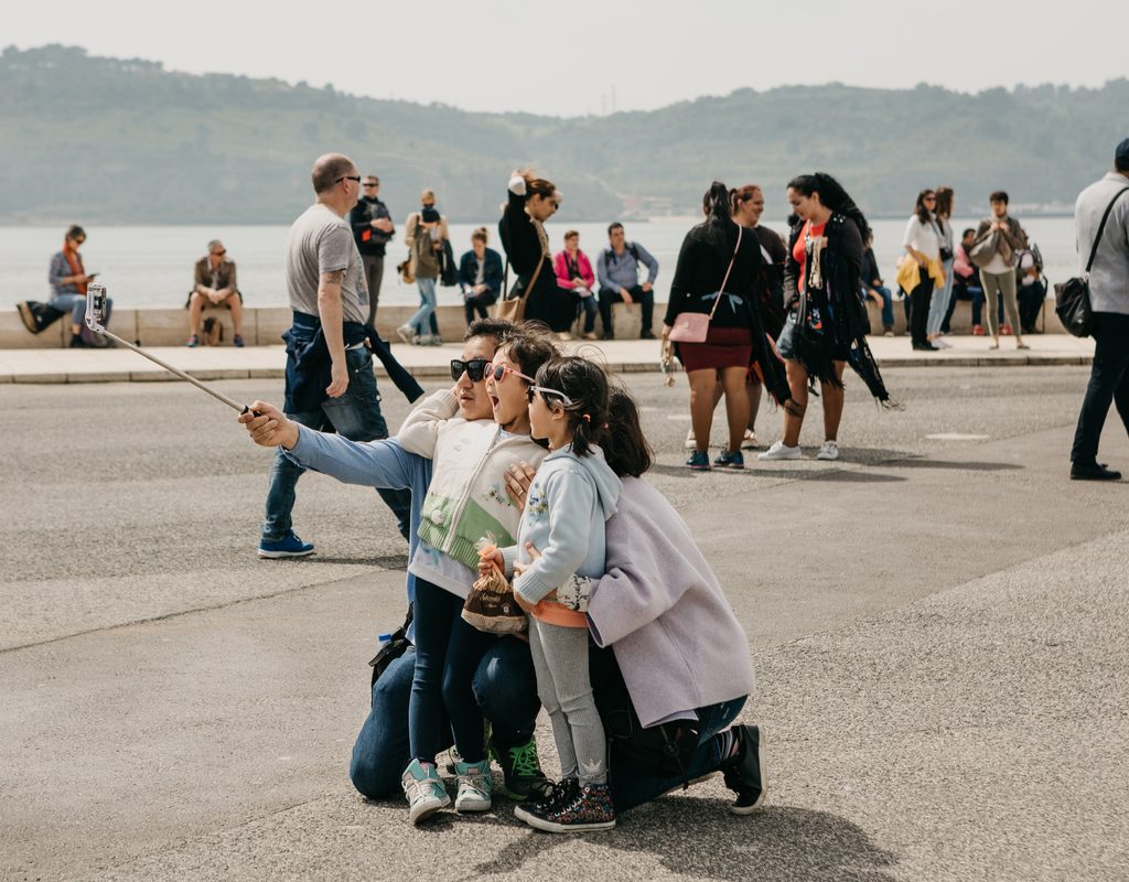 A family looking at the sights in Portugal.