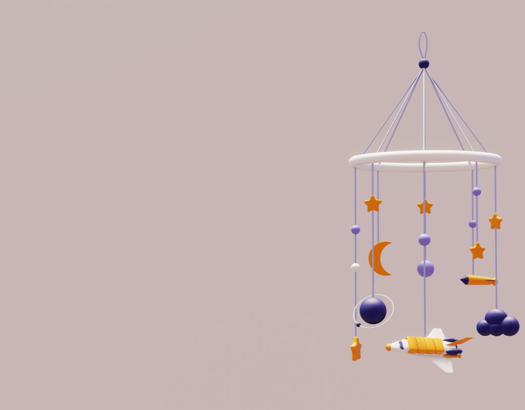 A rocket baby mobile.