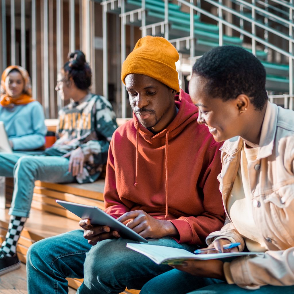 Mom and son looking at colleges online together