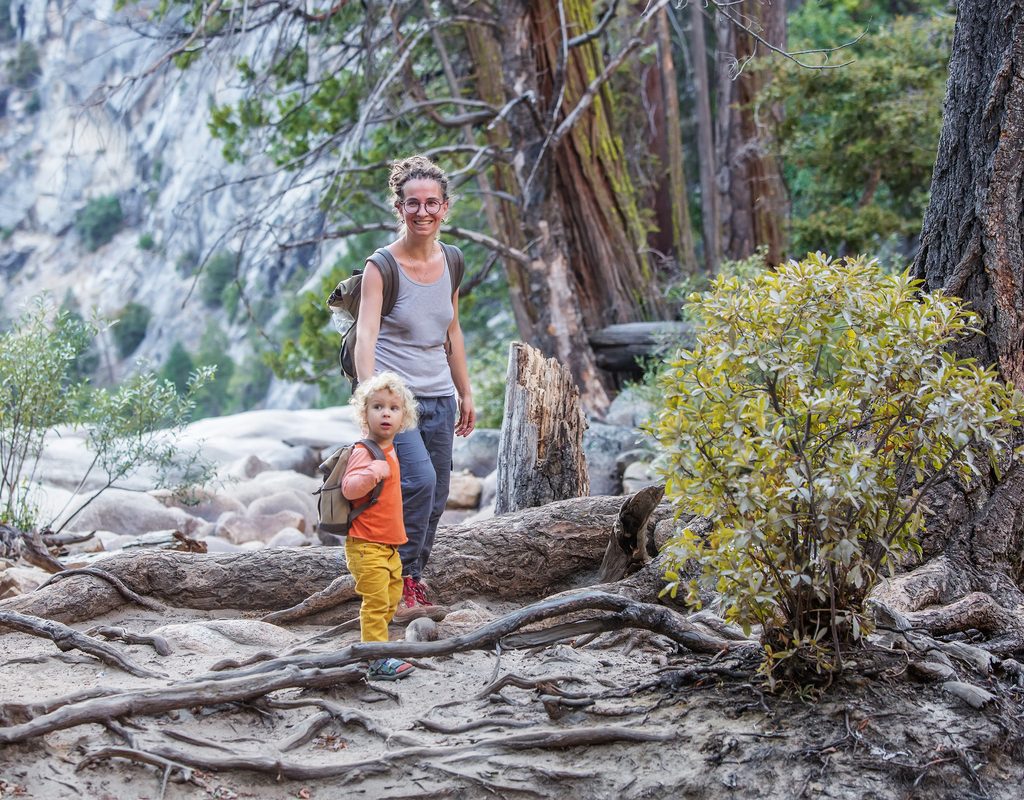 A mother and child in the middle of the wilderness in Yosemite Park