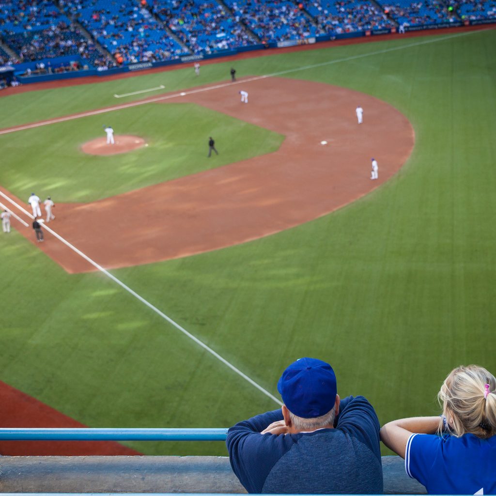 Dad and daughter enjoy baseball game on Father's Day