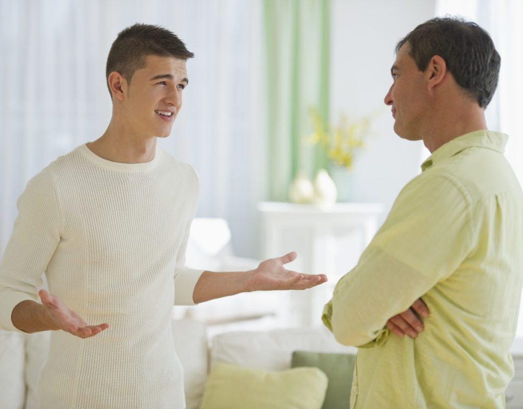 A father and son having a deep discussion.