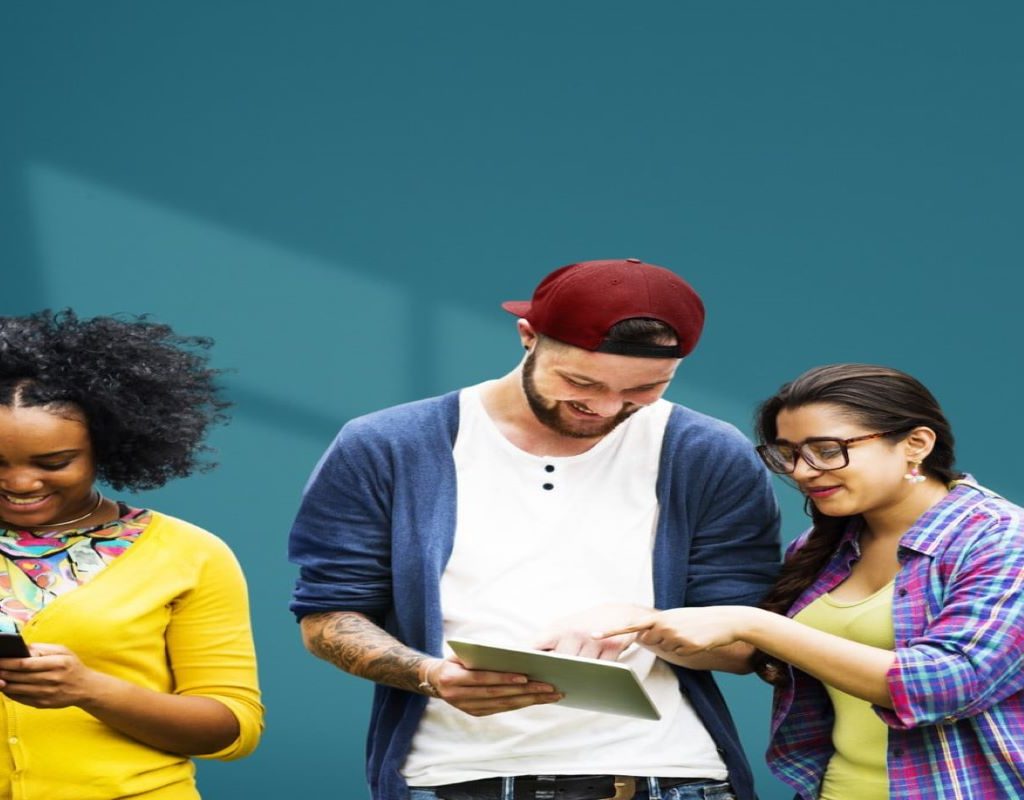 Group of teens looking at their phones
