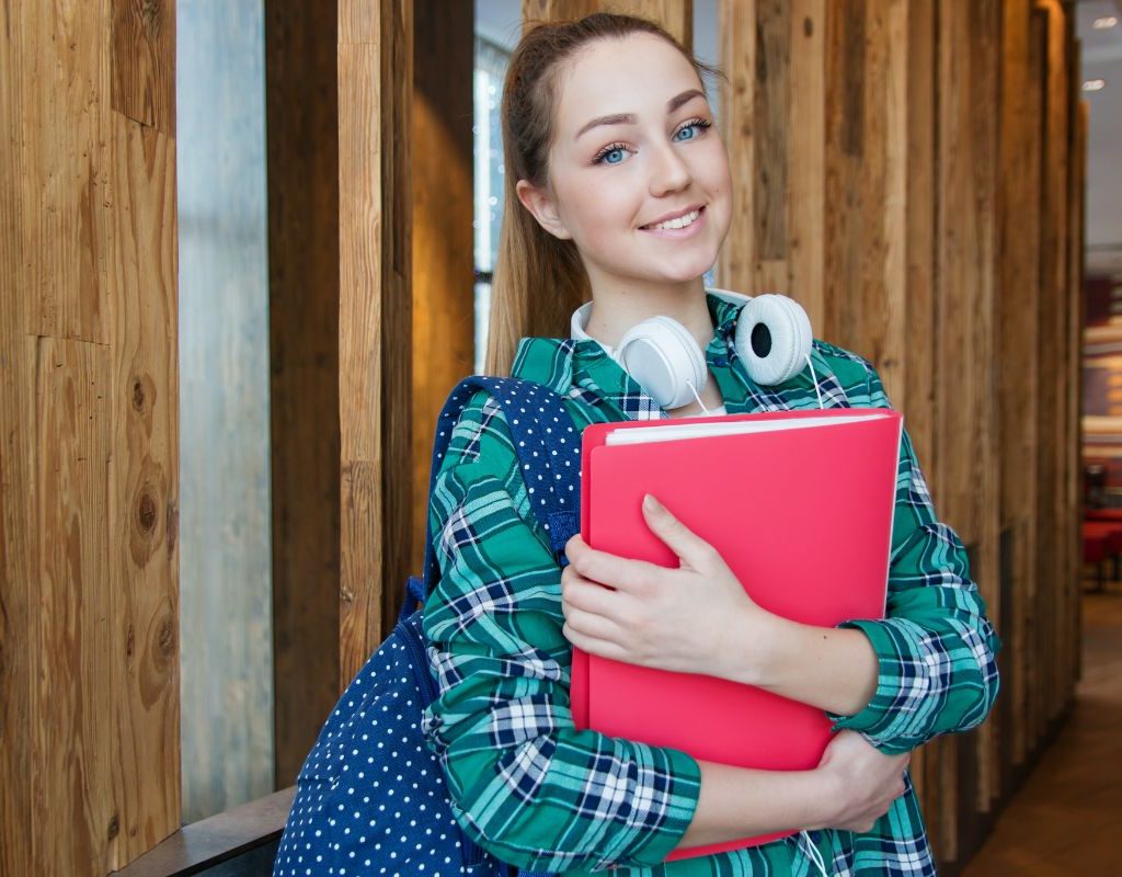 Teen girl with red folder