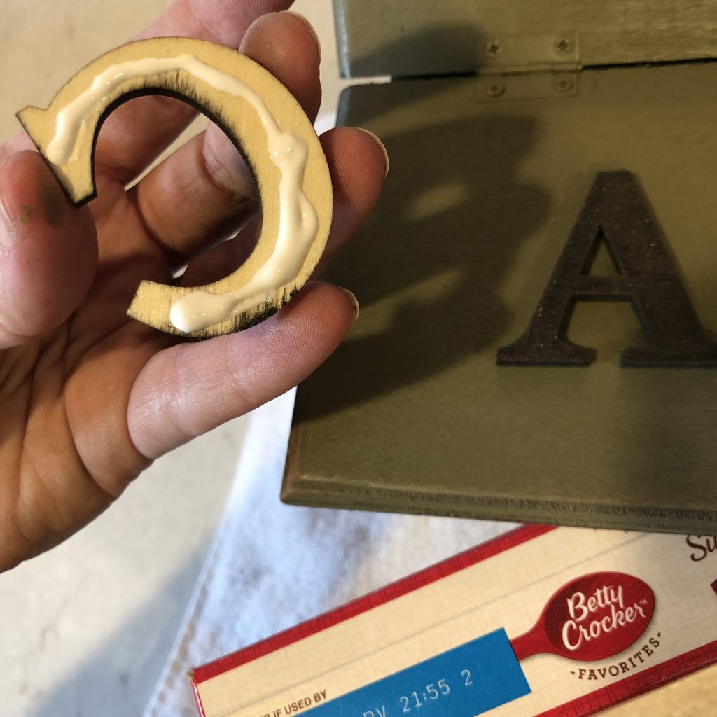 Gluing letters on a mailbox