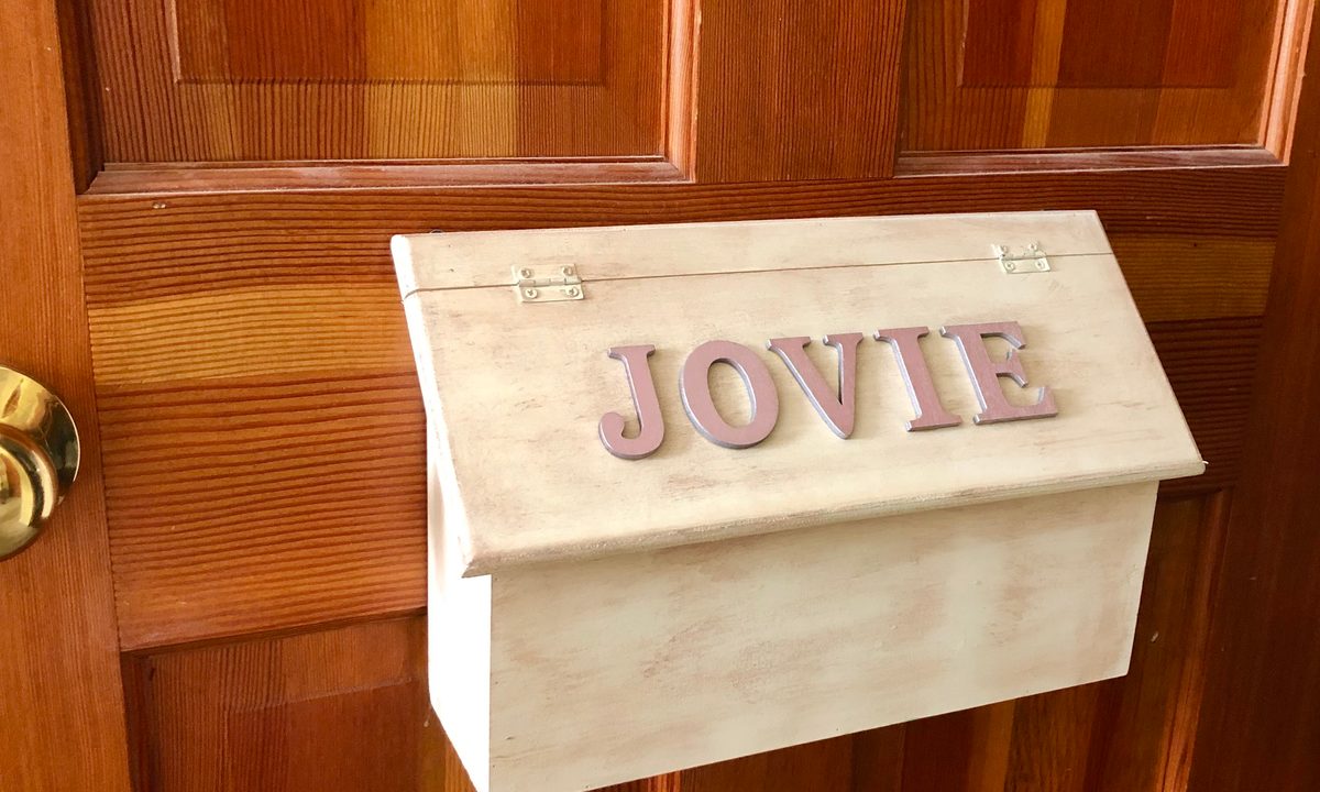 DIY mailbox on a bedroom door