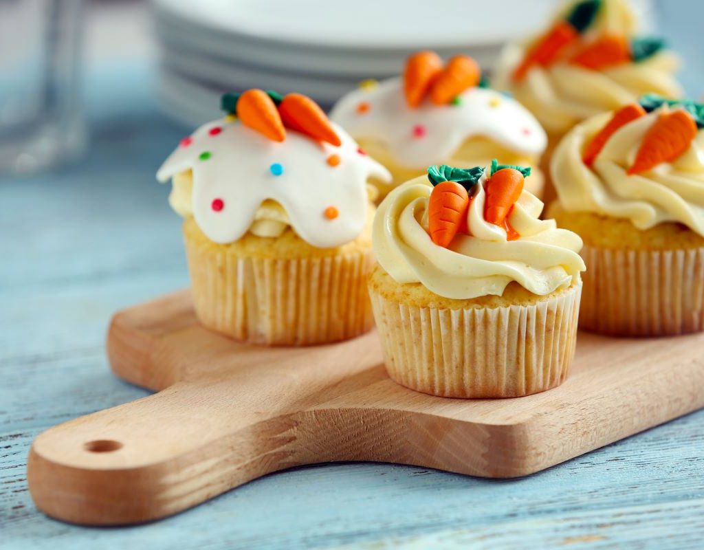 Four delicious carrot cake cupcakes