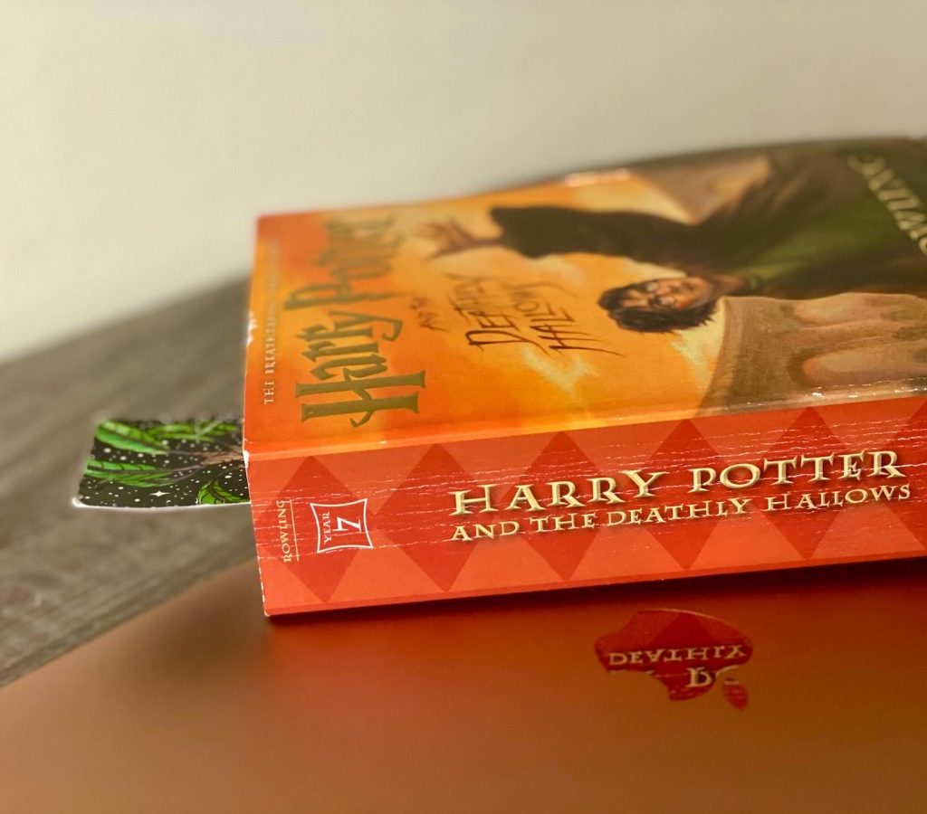 A Harry Potter book sitting on a desk