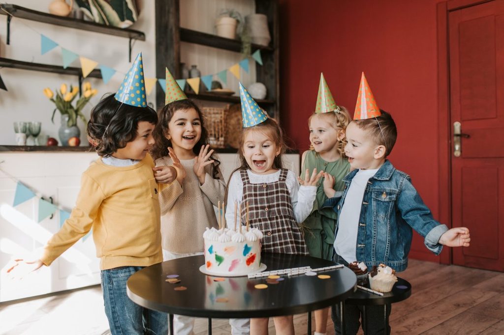 A group of children celebrating a birthday