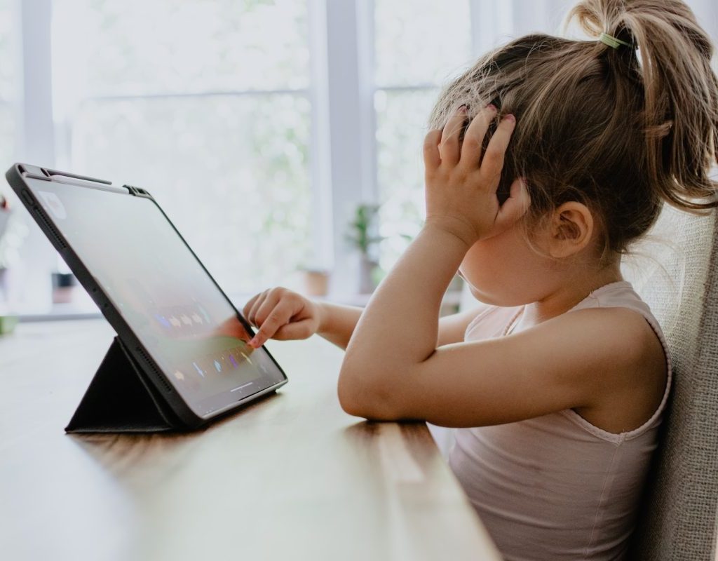 A child on a tablet.