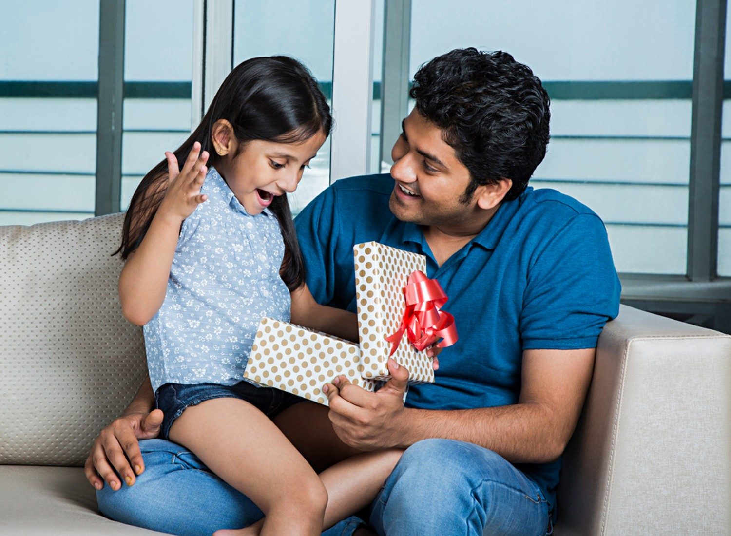 Child opening a gift