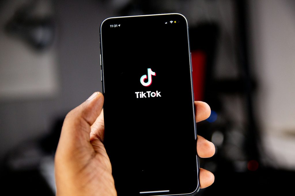 A cell phone with the TikTok app open.