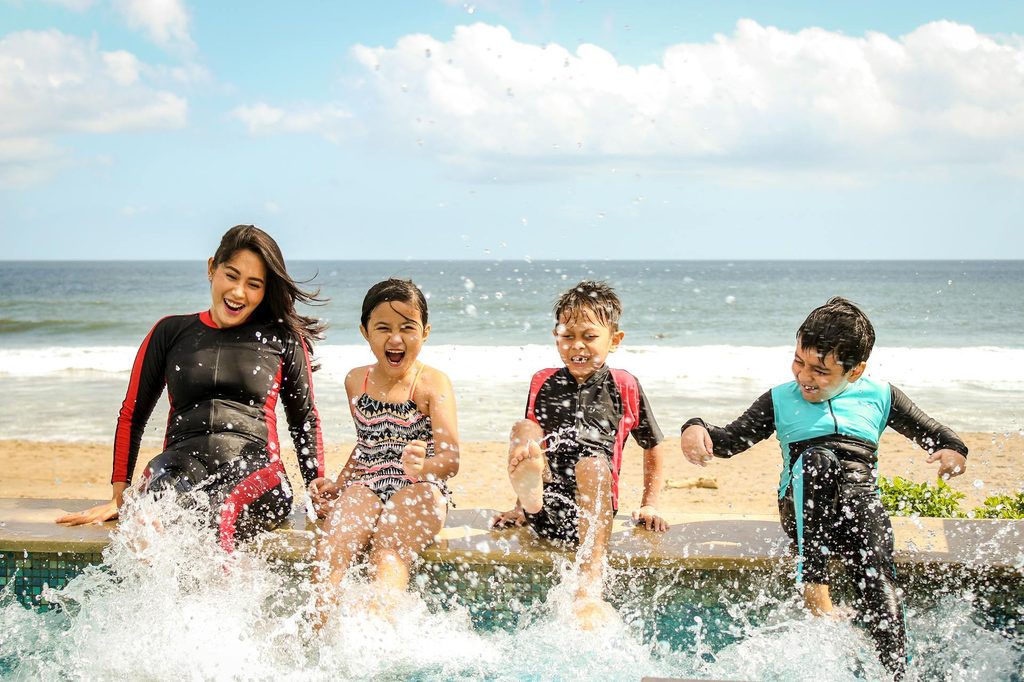 Kids enjoying a vacation in the water.
