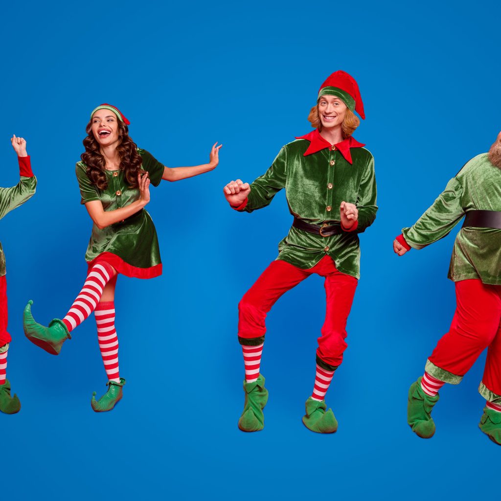 Family of 4 in Christmas costumes