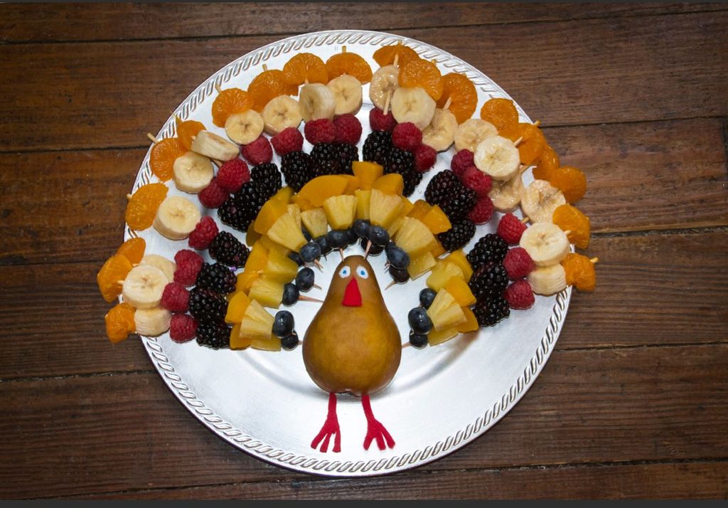 Inviting turkey fruit platter Thanksgiving appetizer