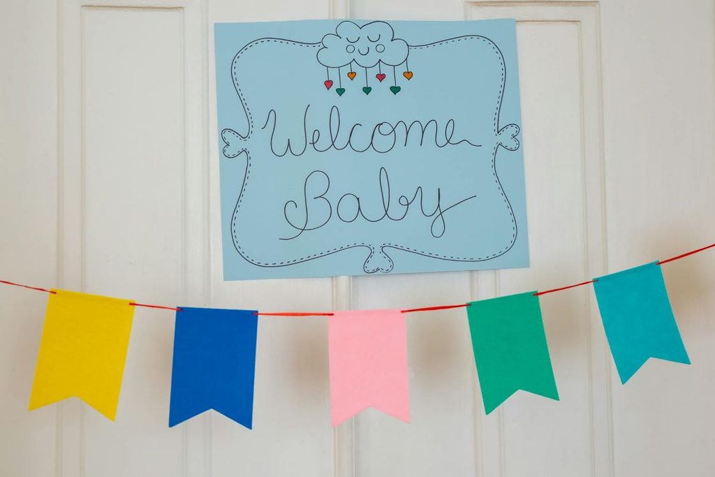 colorful baby shower sign