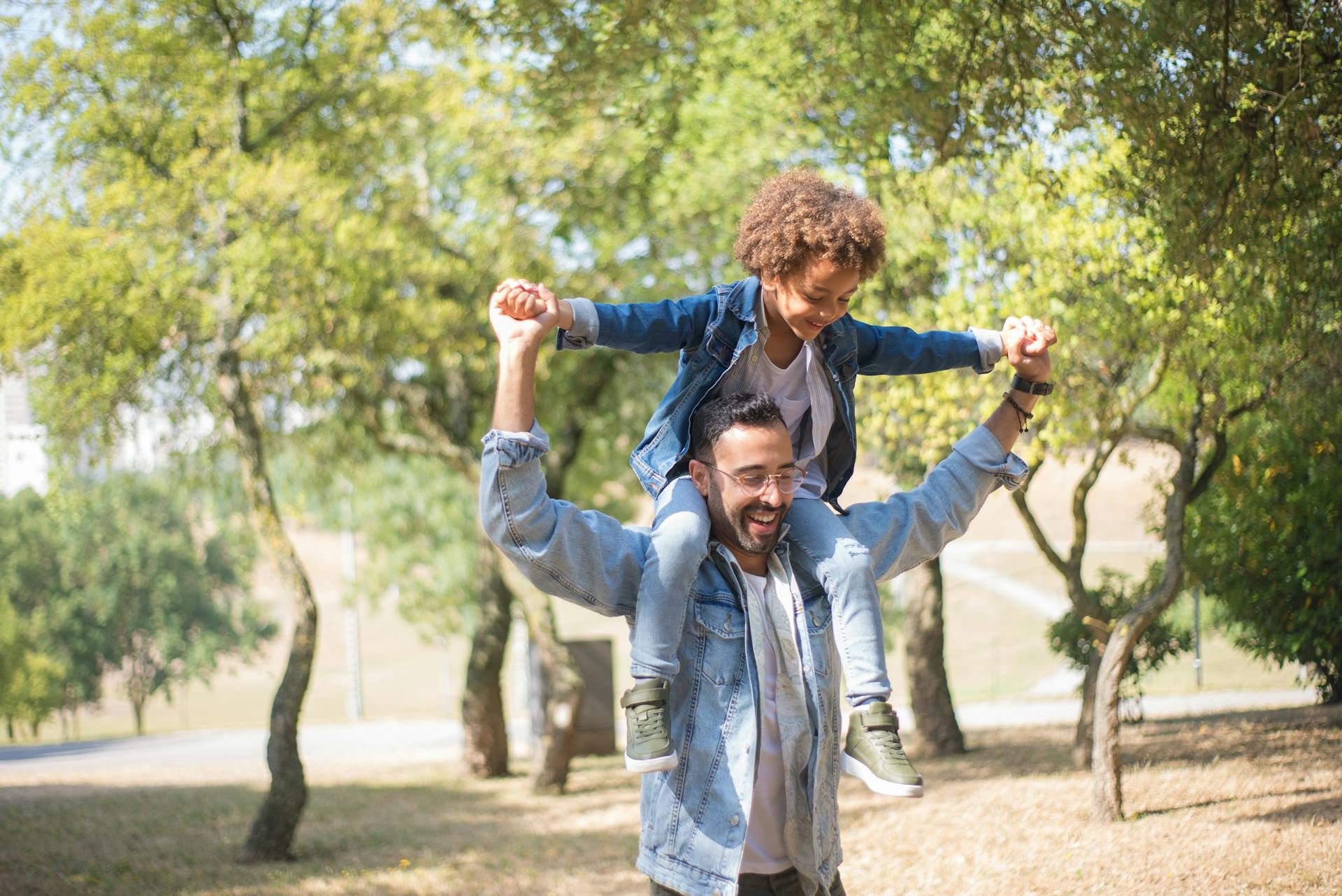 Father daughter outside smiling