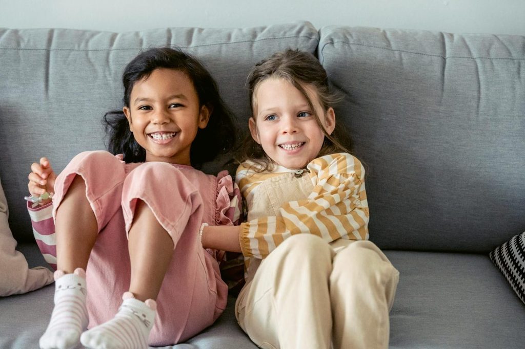 Kids getting ready for a sleepover.