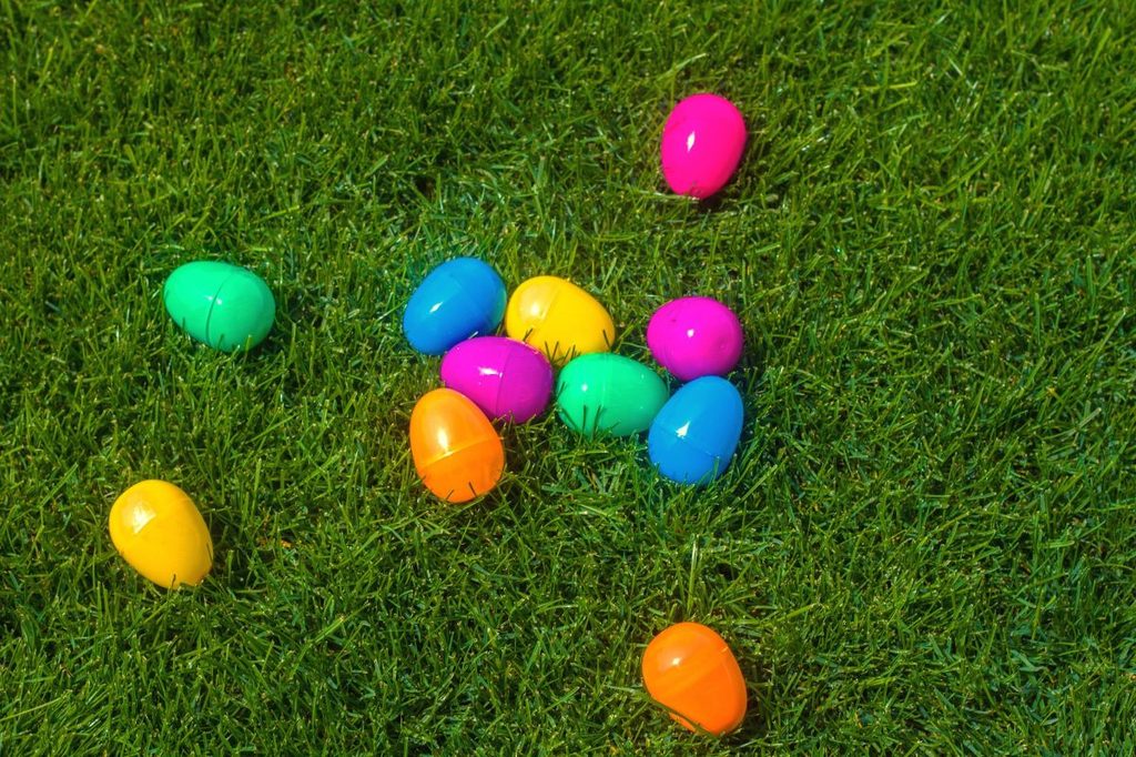 plastic Easter eggs lying in the grass