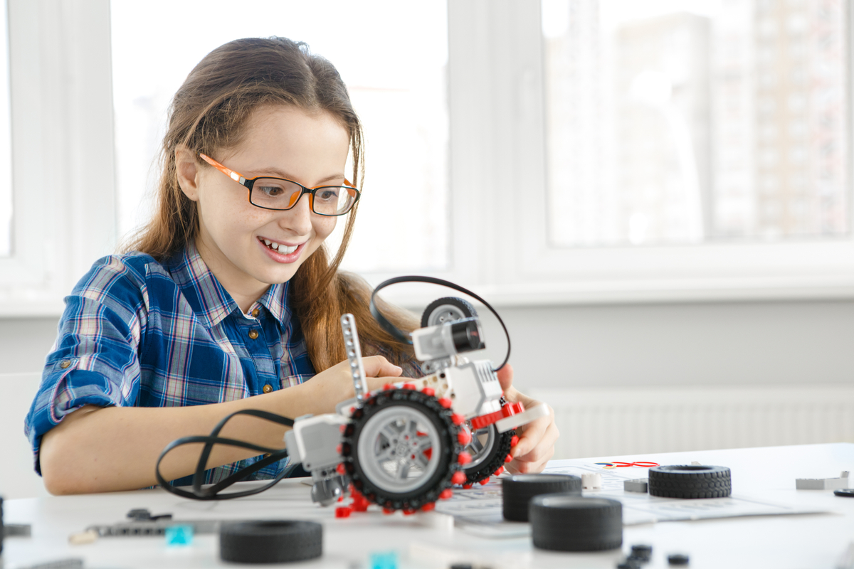 Girl having fun doing a science experiment.