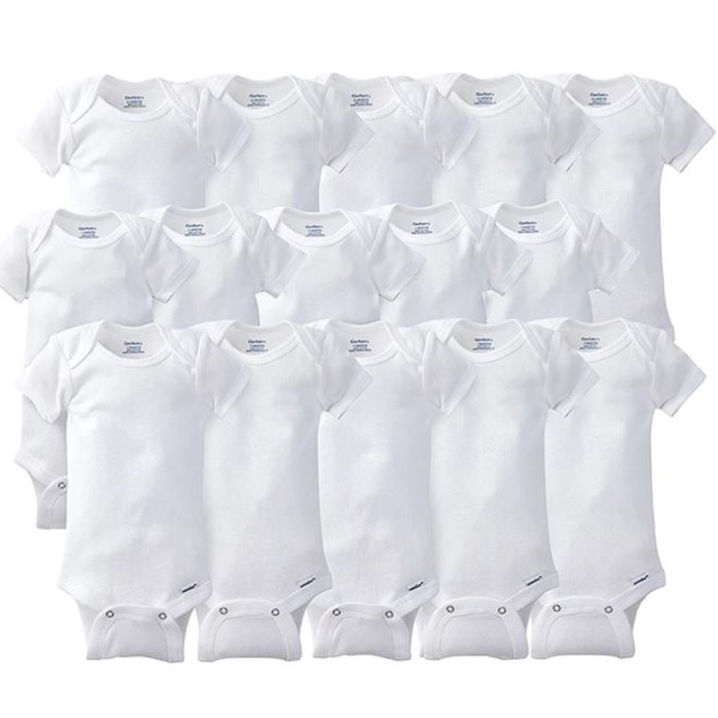 Rows of white baby onesies
