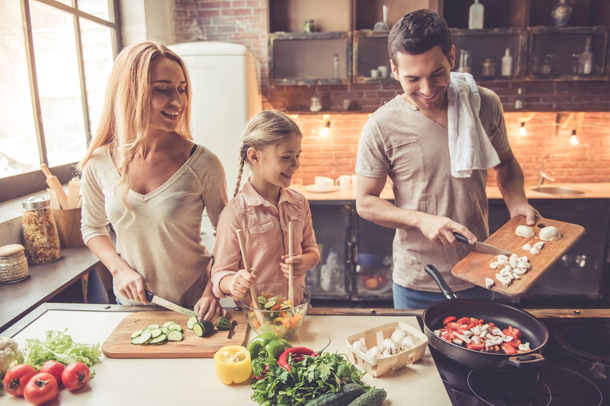 Family cooking together in the kitchen