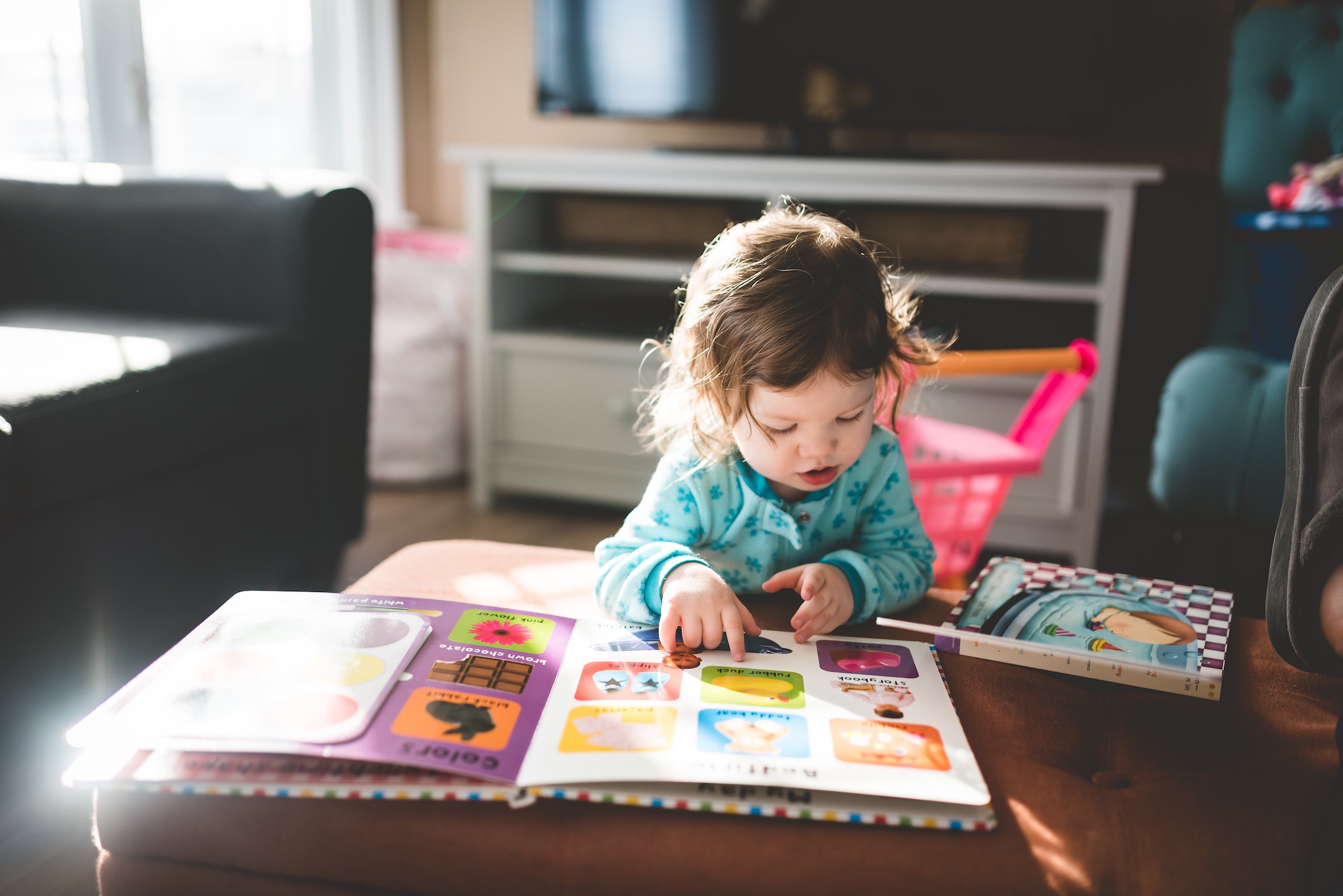 child reading a children's book