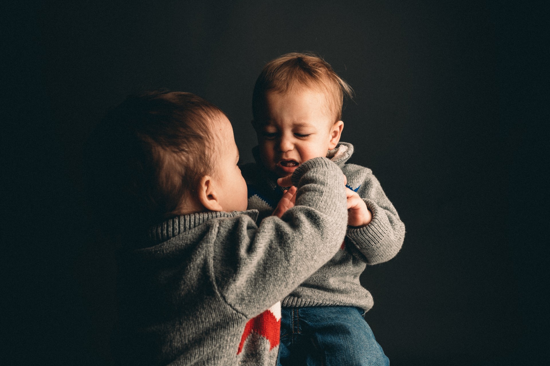 Two toddlers arguing