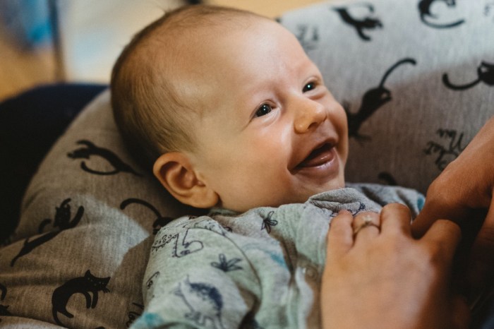 Smiling baby in pajamas