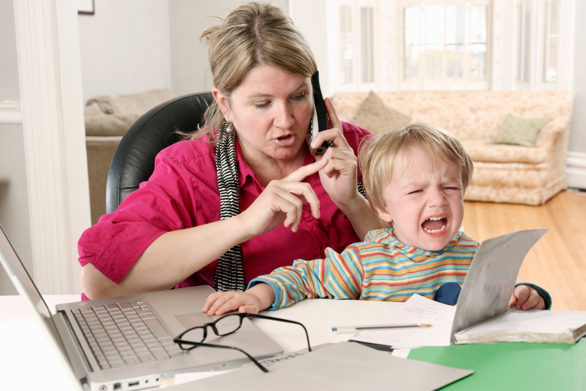 Child crying while mother is on phone