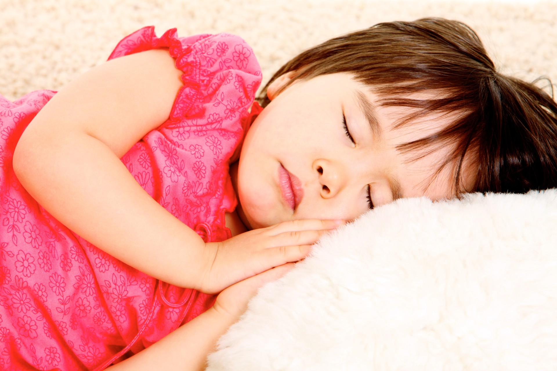 Preschool girl napping in bed