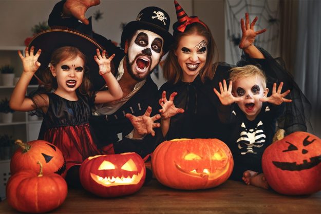 A family dressed up for Halloween.