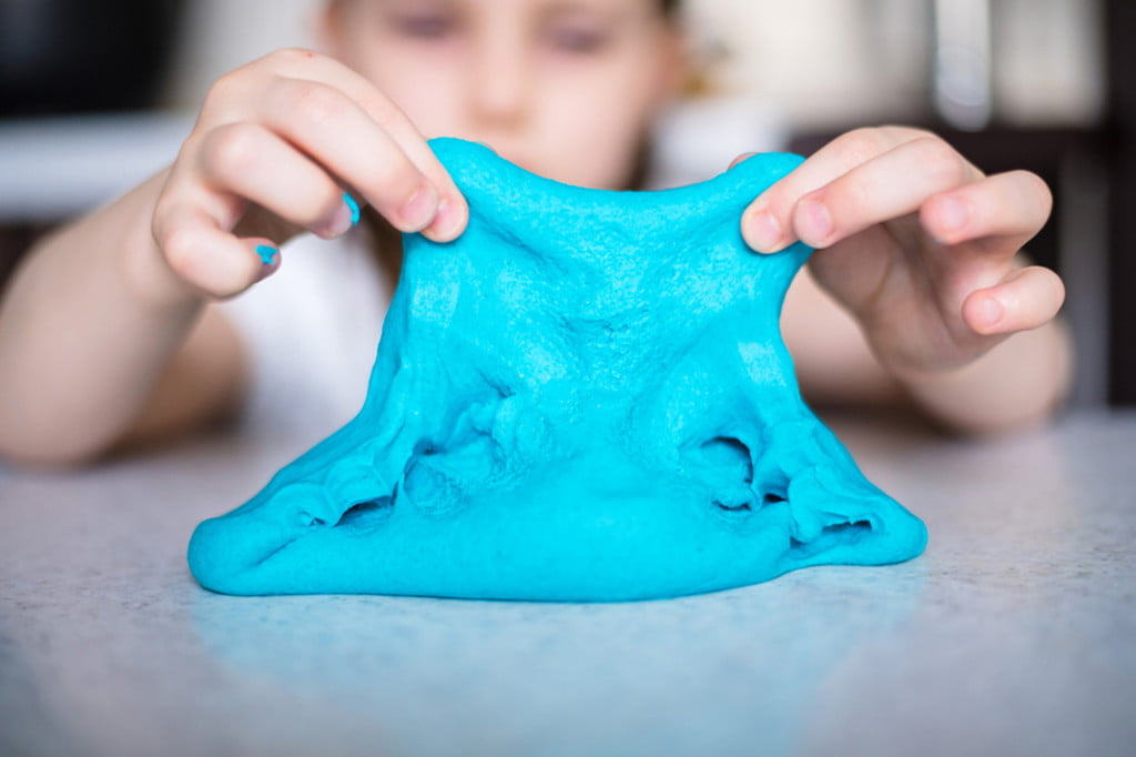 Child making slime.