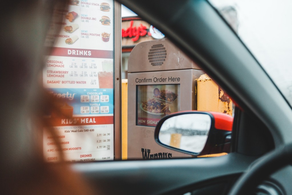 Car in fast-food drive-thru