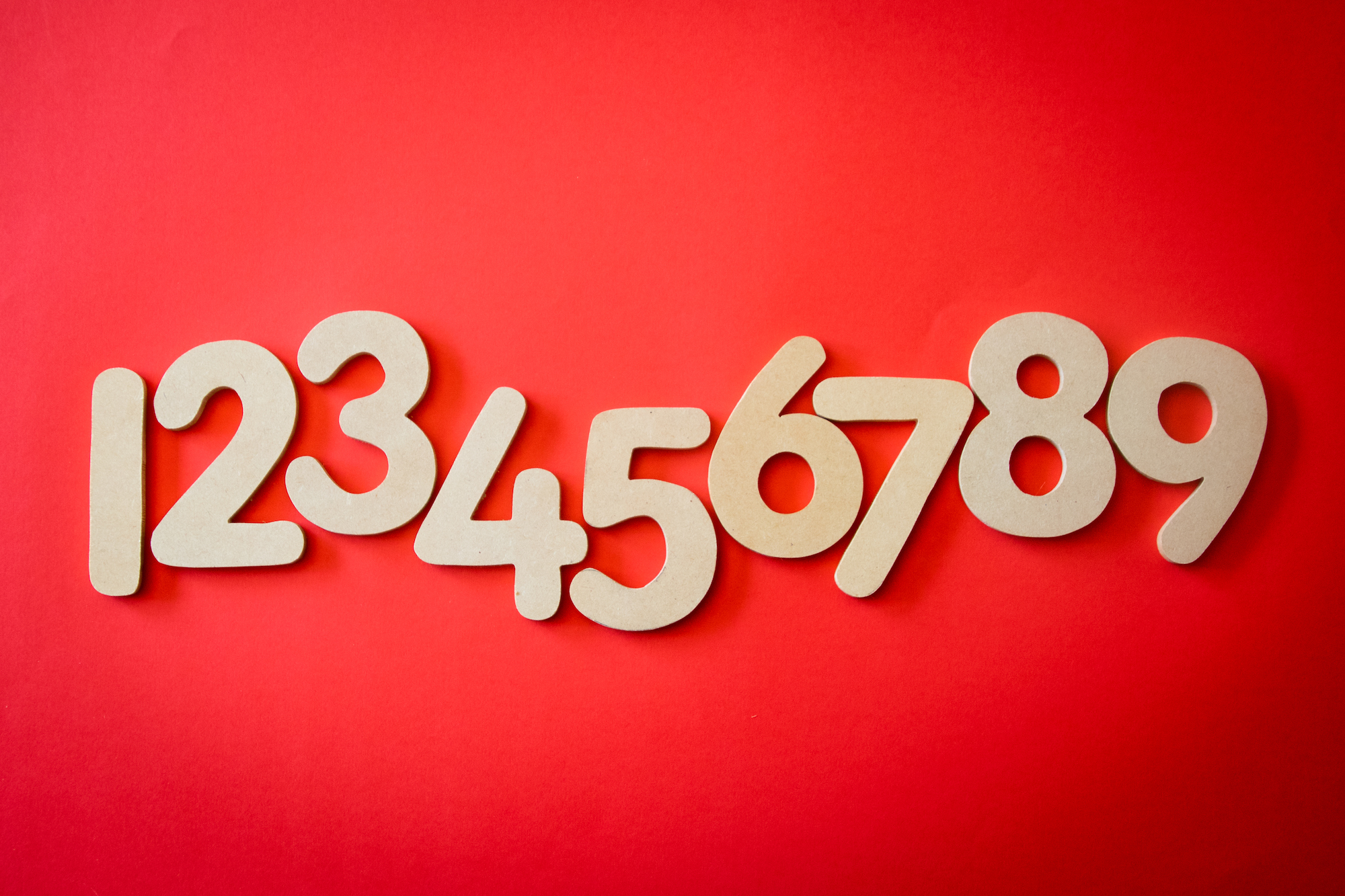 numbers one through nine on red background