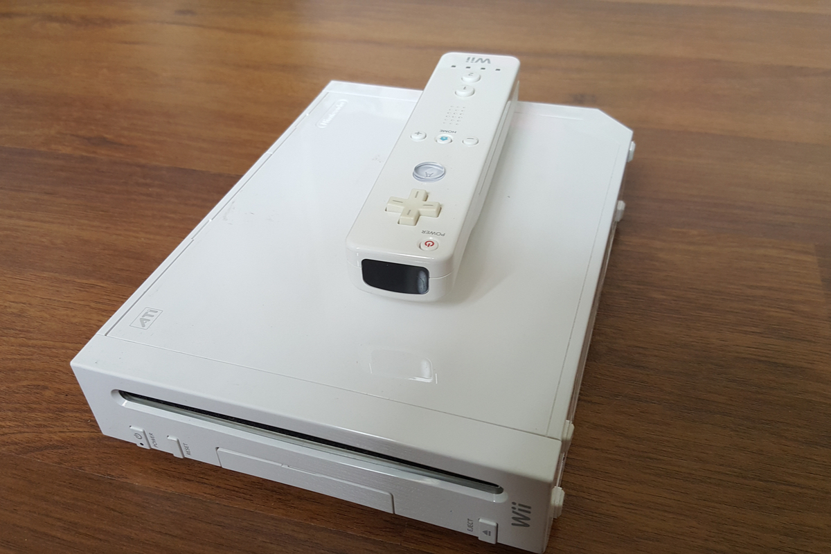 Nintendo Wii console on a wooden table