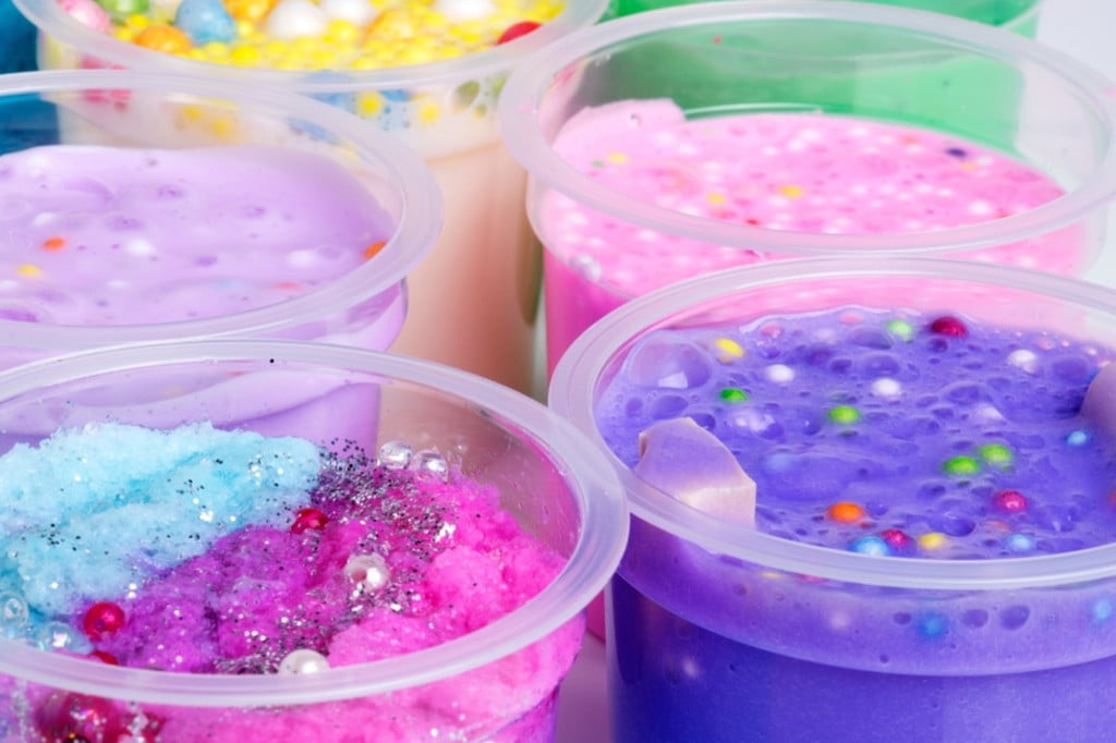 Containers of different kinds of slime.