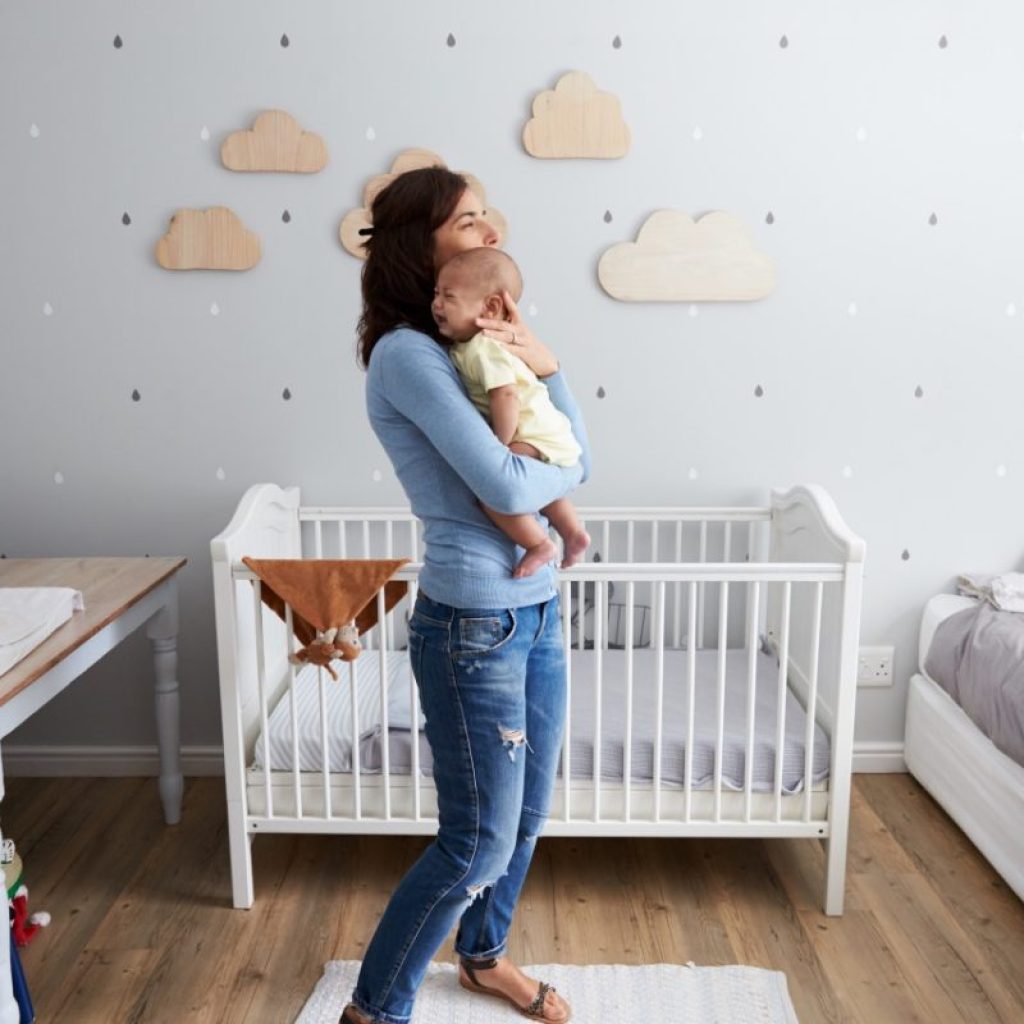 Mother comforting a crying baby