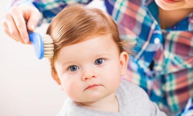 Brushing a toddler's hair