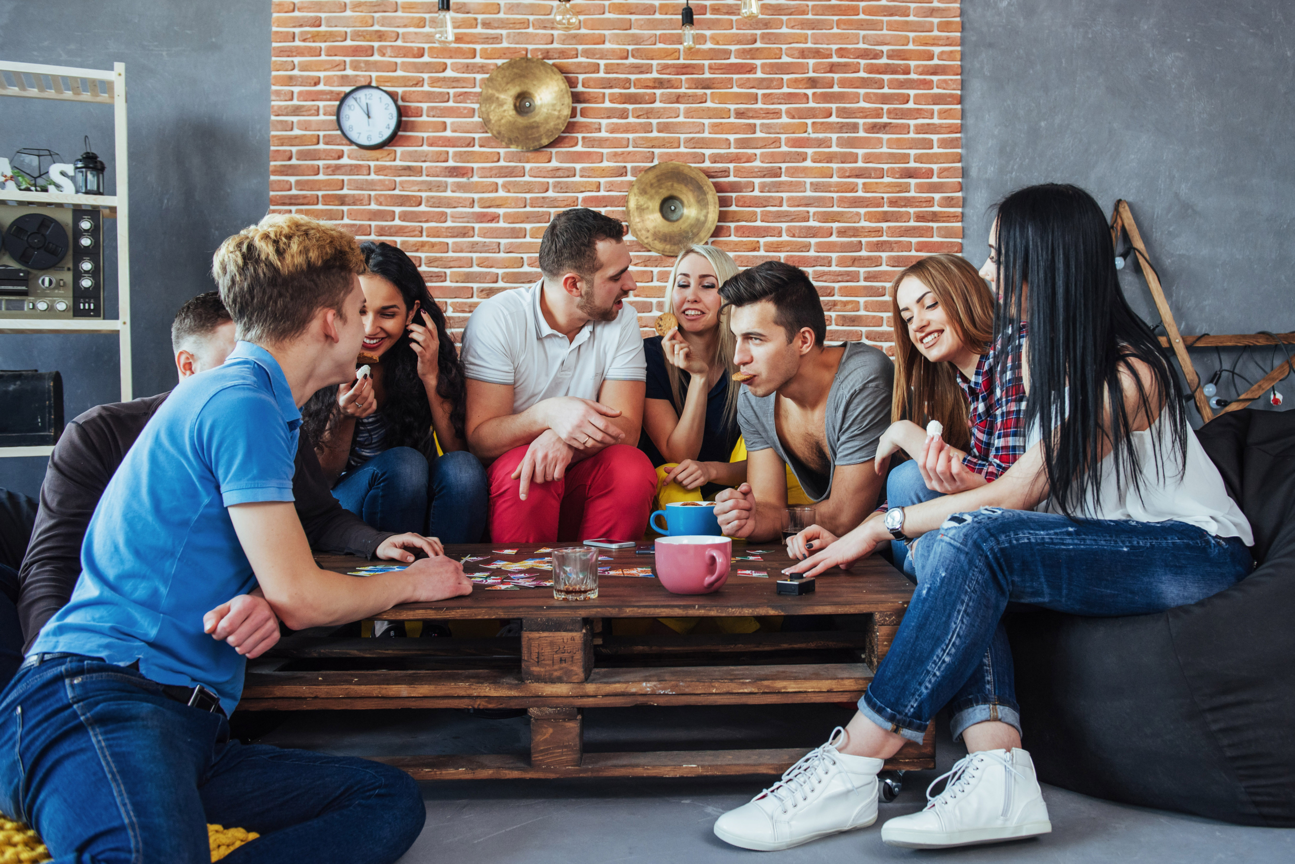 Teens playing a board game