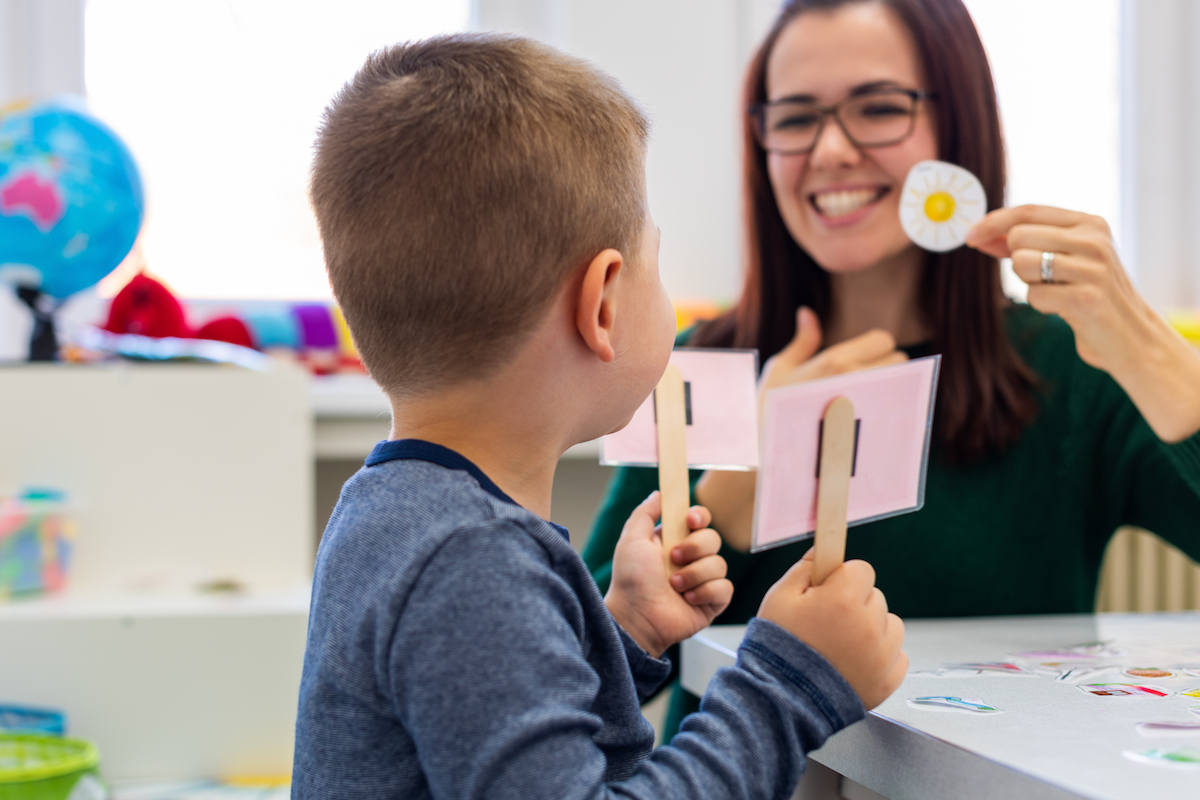 Child practicing speech therapy