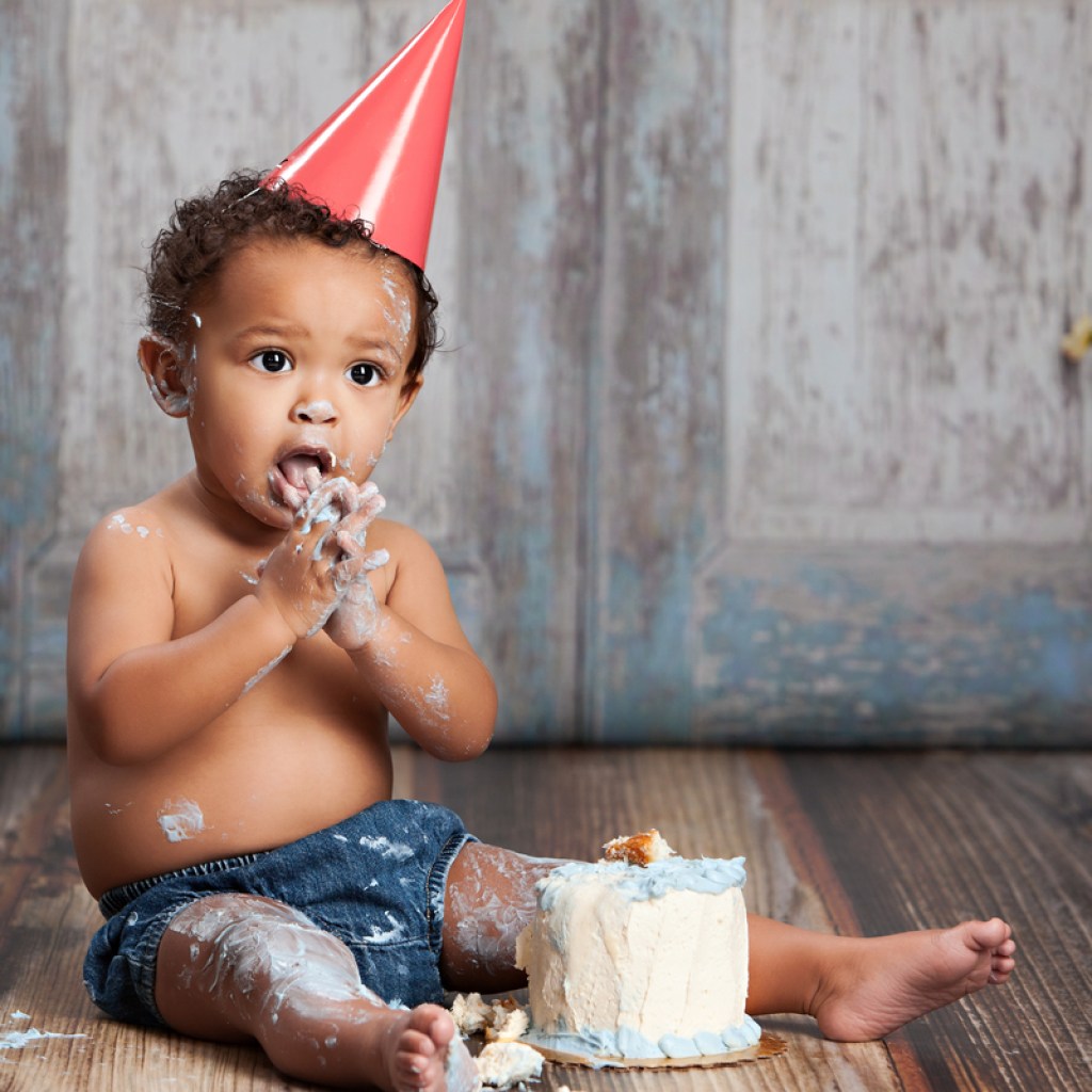 Baby boy eating his smash cake