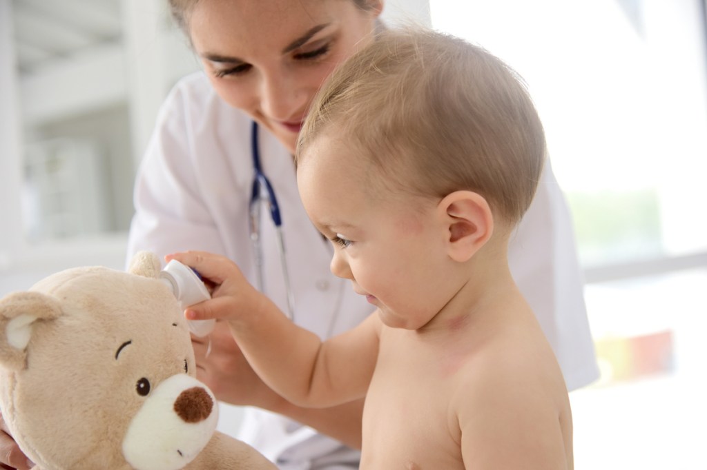 Baby with a doctor at their checkup